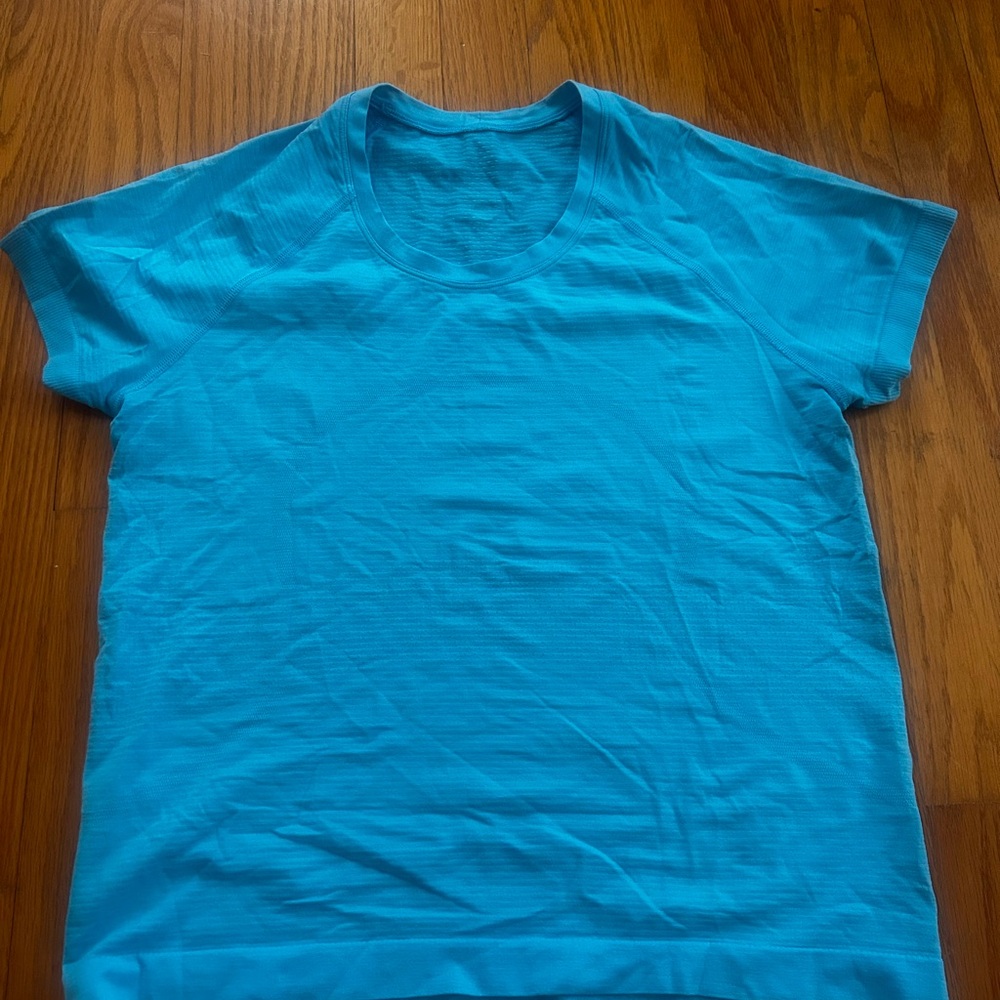 Lululemon swiftly race length- size 8 (electric turquoise)